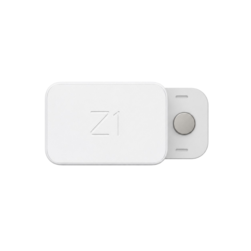 The Z1 sensor — a premium matte-white rounded rectangle with a debossed Z1 and magnetic charge contact